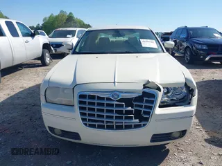2007 Chrysler 300 Touring z VIN 2C3KA53G17H715729, wystawiony jako IAAI lot #41999282 z przebiegiem 130 444 mil mil oraz . Historia ofert i sprzedaży dostępna na DreamBid. Obrazek 12.
