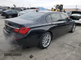2014 BMW 7 Series 740Li xDrive with VIN WBAYF4C59ED281776, listed as a Copart auction lot 83563234 with 77,899 mi miles and Salvage Title. Bid and sale history available at carsss.com. Image 3.