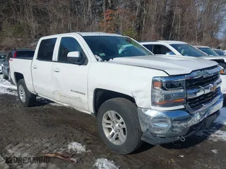 2016 Chevrolet Silverado 1500 LT with VIN 3GCUKREH8GG223505, listed as a IAAI auction lot 41451053 with 134,701 mi miles. Bid and sale history available at carsss.com. Image 1.