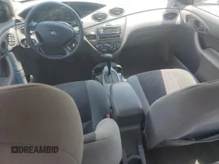 2003 Ford Focus SE with VIN 1FAFP34353W231334, listed as a Copart auction lot 63844205 with 86,601 mi miles and Salvage title. Bid and sale history available at DreamBid. Image 8.