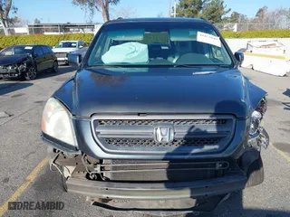 2003 Honda Pilot EX with VIN 2HKYF18633H599550, listed as a IAAI auction lot 41813549 with 242,103 mi miles. Bid and sale history available at carsss.com. Image 13.