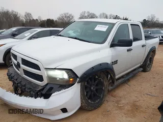 2016 Ram 1500 Tradesman with VIN 1C6RR7KT6GS157065, listed as a IAAI auction lot 41392360 with 102,490 mi miles and . Bid and sale history available at DreamBid. Image 2.