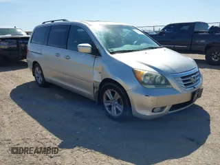 2008 Honda Odyssey Touring with VIN 5FNRL38918B059770, listed as a IAAI auction lot 41920865 with 231,599 mi miles. Bid and sale history available at carsss.com. Image 1.
