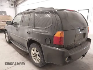 2006 GMC Envoy Denali with VIN 1GKET63M662310282, listed as a IAAI auction lot 41367523 with 216,451 mi miles. Bid and sale history available at carsss.com. Image 3.