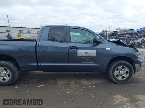 2010 Toyota Tundra with VIN 5TFUM5F16AX005232, listed as a IAAI auction lot 41688311 with 251,296 mi miles and . Bid and sale history available at DreamBid. Image 13.