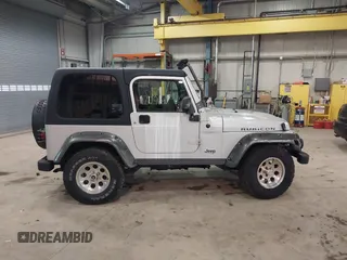 2003 Jeep Wrangler Rubicon with VIN 1J4FA69S13P375142, listed as a IAAI auction lot 41709647 with 125,443 mi miles and . Bid and sale history available at DreamBid. Image 14.