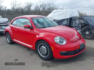 2012 Volkswagen Beetle 2.5L PZEV with VIN 3VWJP7AT4CM608099, listed as a IAAI auction lot 41566505 with 130,189 mi miles. Bid and sale history available at carsss.com. Image 1.