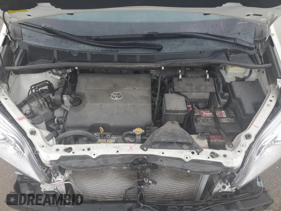 2015 Toyota Sienna XLE with VIN 5TDYK3DC6FS630405, listed as a Copart auction lot 59872045 with 60,306 mi miles and Salvage title. Bid and sale history available at DreamBid. Image 12.