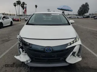 2021 Toyota Prius LE z VIN JTDKAMFP9M3196770, wystawiony jako Copart lot #54309555 z przebiegiem 21 948 mil mil oraz Szkoda całkowita • Salvage title. Historia ofert i sprzedaży dostępna na DreamBid. Obrazek 5.