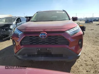 2024 Toyota RAV4 Hybrid XLE Premium with VIN JTMB6RFVXRD120389, listed as a Copart auction lot 47596985 with 16,956 mi miles and Salvage Title. Bid and sale history available at DreamBid. Image 5.