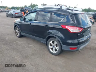2013 Ford Escape SE with VIN 1FMCU0G9XDUD47433, listed as a IAAI auction lot 42233412 with 180,098 mi miles and . Bid and sale history available at DreamBid. Image 3.