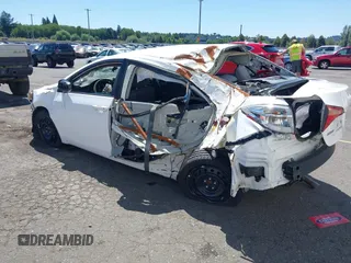 2018 Toyota Corolla L with VIN 2T1BURHE0JC090596, listed as a IAAI auction lot 42655247 with Not provided miles and . Bid and sale history available at DreamBid. Image 3.