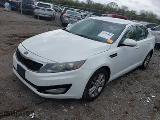 2013 Kia Optima LX with VIN 5XXGM4A77DG214512, listed as a IAAI auction lot 41939509 with 170,193 mi miles. Bid and sale history available at carsss.com. Image 2.