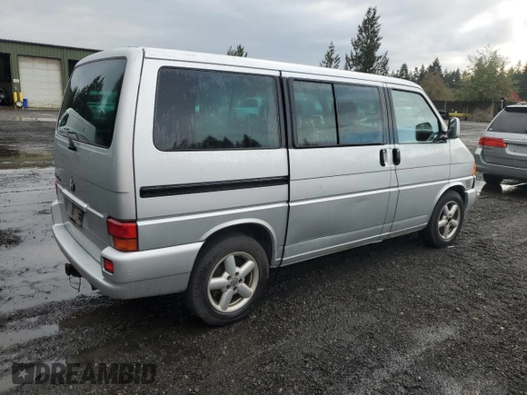 2001 Volkswagen EuroVan MV с VIN WV2MB47031H098986, выставлен на аукционе Copart как лот 77587294 с пробегом 161 046 миль миль и Чистый • Clean title. История ставок и продаж доступна на DreamBid. Изображение 3.