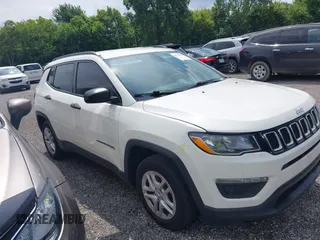 2018 Jeep Compass Sport with VIN 3C4NJCAB0JT124679, listed as a IAAI auction lot 42720262 with 119,267 mi miles and . Bid and sale history available at DreamBid. Image 13.