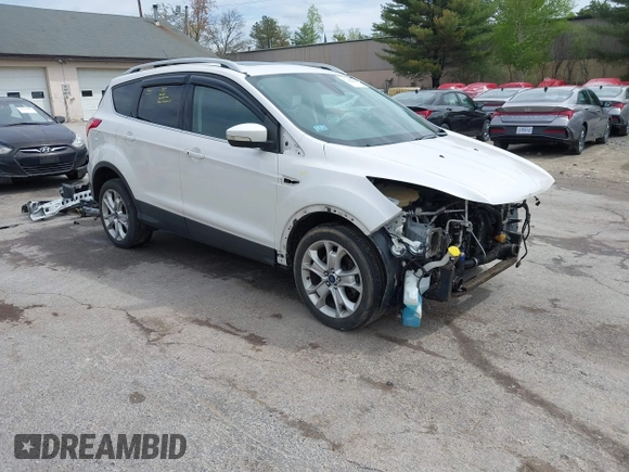 2016 Ford Escape Titanium with VIN 1FMCU9J98GUA00832, listed as a IAAI auction lot 42188941 with 90,764 mi miles and . Bid and sale history available at DreamBid. Image 1.