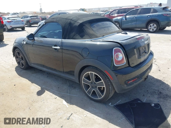 2012 MINI Roadster S with VIN WMWSY3C56CT144520, listed as a IAAI auction lot 41818205 with 86,836 mi miles and . Bid and sale history available at DreamBid. Image 3.