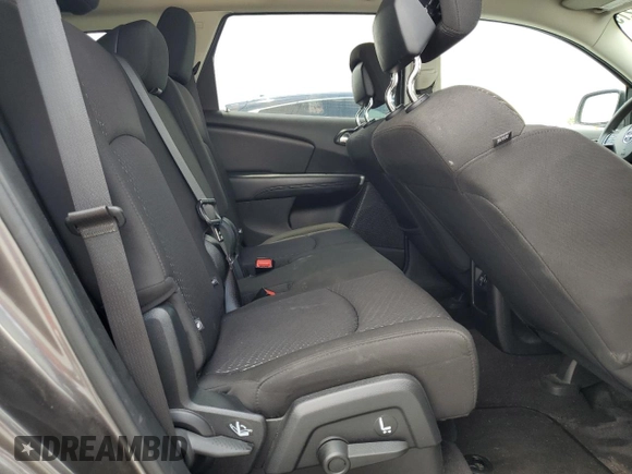 2017 Dodge Journey SE z VIN 3C4PDCAB5HT694834, wystawiony jako Copart lot #56306275 z przebiegiem 75 286 mil mil oraz Szkoda całkowita • Salvage title. Historia ofert i sprzedaży dostępna na DreamBid. Obrazek 11.