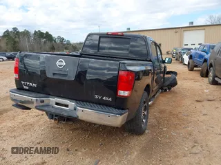 2012 Nissan Titan S with VIN 1N6AA0EC1CN322929, listed as a IAAI auction lot 41792414 with 124,182 mi miles. Bid and sale history available at carsss.com. Image 4.