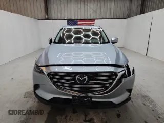 2023 Mazda CX-9 Touring with VIN JM3TCBCY9P0656636, listed as a Copart auction lot 64243905 with 59,788 mi miles and Non repairable. Bid and sale history available at DreamBid. Image 5.
