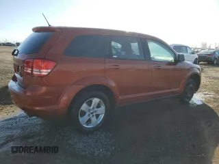 2013 Dodge Journey American Value with VIN 3C4PDCAB4DT590975, listed as a Copart auction lot 55627725 with 212,659 mi miles and Clean Title. Bid and sale history available at DreamBid. Image 3.