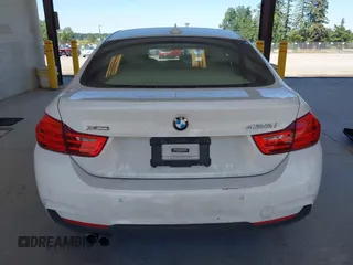 2015 BMW 4 Series 428i xDrive z VIN WBA4A7C55FD413965, wystawiony jako IAAI lot #42368615 z przebiegiem 108 308 mil mil oraz . Historia ofert i sprzedaży dostępna na DreamBid. Obrazek 16.