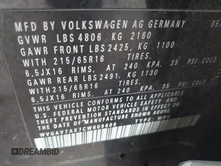 2012 Volkswagen Tiguan SE with VIN WVGAV7AX7CW609609, listed as a IAAI auction lot 41947280 with 77,942 mi miles and . Bid and sale history available at DreamBid. Image 9.