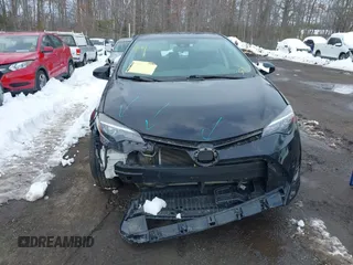 2018 Toyota Corolla L z VIN 5YFBURHE0JP801312, wystawiony jako IAAI lot #41235233 z przebiegiem 92 340 mil mil oraz . Historia ofert i sprzedaży dostępna na DreamBid. Obrazek 12.