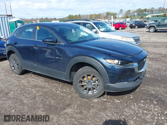 2023 Mazda CX-30 S with VIN 3MVDMBAM1PM583896, listed as a IAAI auction lot 41732091 with 26,298 mi miles and . Bid and sale history available at carsss.com. Image 1.