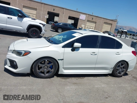 2021 Subaru WRX z VIN JF1VA1A68M9801794, wystawiony jako IAAI lot #42421444 z przebiegiem 100 920 mil mil oraz . Historia ofert i sprzedaży dostępna na DreamBid. Obrazek 14.