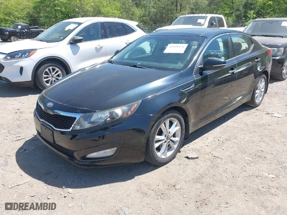 2011 Kia Optima EX with VIN KNAGN4A71B5139155, listed as a IAAI auction lot 42048976 with 130,400 mi miles. Bid and sale history available at carsss.com. Image 2.