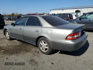 2000 Lexus ES 300 with VIN JT8BF28GXY5091263, listed as a Copart auction lot 61767595 with 250,041 mi miles and Salvage title. Bid and sale history available at DreamBid. Image 2.