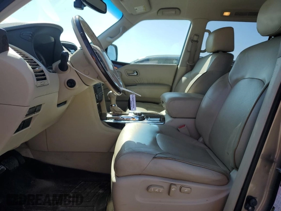 2015 Infiniti QX80 with VIN JN8AZ2NEXF9082838, listed as a Copart auction lot 51875485 with 138,533 mi miles and Salvage title. Bid and sale history available at DreamBid. Image 7.