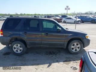 2007 Ford Escape XLT with VIN 1FMYU03167KA10635, listed as a IAAI auction lot 42009859 with 1 mi miles. Bid and sale history available at carsss.com. Image 13.