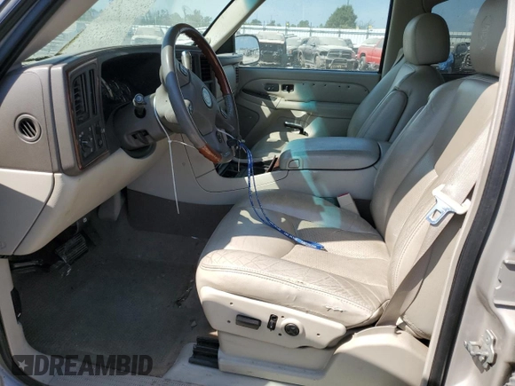 2006 Cadillac Escalade z VIN 1GYEK63N26R128359, wystawiony jako Copart lot #59198834 z przebiegiem 309 682 mil mil oraz Szkoda całkowita • Salvage title. Historia ofert i sprzedaży dostępna na DreamBid. Obrazek 7.