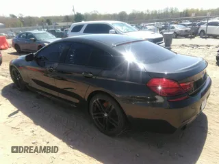 2014 BMW 6 Series 640i z VIN WBA6A0C57EDZ04682, wystawiony jako IAAI lot #41891362 z przebiegiem 140 478 mil mil oraz . Historia ofert i sprzedaży dostępna na DreamBid. Obrazek 3.