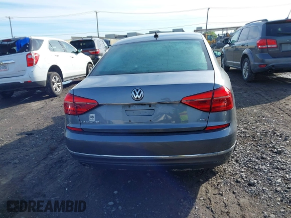 2016 Volkswagen Passat SE z VIN 1VWBT7A32GC016577, wystawiony jako IAAI lot #42334269 z przebiegiem 128 006 mil mil oraz . Historia ofert i sprzedaży dostępna na DreamBid. Obrazek 16.