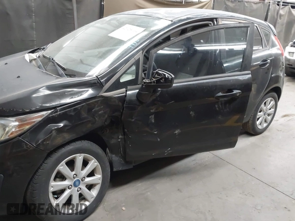 2013 Ford Fiesta SE with VIN 3FADP4EJ1DM107945, listed as a IAAI auction lot 42025064 with Not Provided miles and . Bid and sale history available at DreamBid. Image 6.