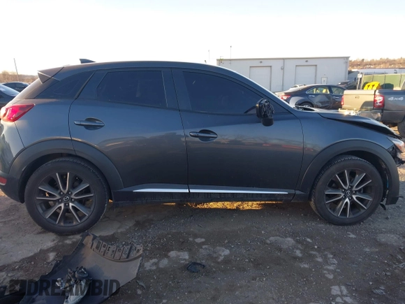 2016 Mazda CX-3 Grand Touring with VIN JM1DKBD74G0115936, listed as a IAAI auction lot 41296104 with 191,408 mi miles. Bid and sale history available at carsss.com. Image 13.