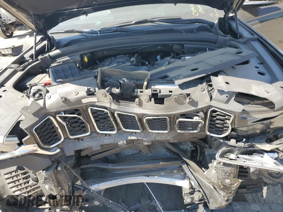 2023 Jeep Grand Cherokee Altitude z VIN 1C4RJHAGXPC548773, wystawiony jako Copart lot #71000974 z przebiegiem 35 985 mil mil oraz Szkoda całkowita • Salvage title. Historia ofert i sprzedaży dostępna na DreamBid. Obrazek 11.