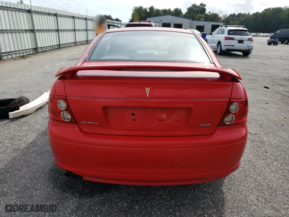 2004 Pontiac GTO with VIN 6G2VX12G64L299636, listed as a Copart auction lot 73538864 with 74,119 mi miles and Salvage Title. Bid and sale history available at carsss.com. Image 6.