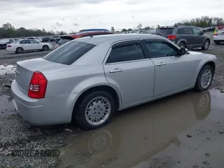 2008 Chrysler 300 LX with VIN 2C3KA43RX8H175472, listed as a IAAI auction lot 41875765 with 146,393 mi miles. Bid and sale history available at carsss.com. Image 4.