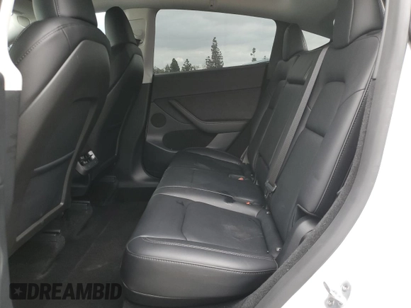 2024 Tesla Model Y Long Range with VIN 7SAYGDEE8RF088808, listed as a Copart auction lot 50406865 with 8,150 mi miles and Salvage title. Bid and sale history available at DreamBid. Image 10.