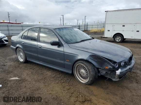 2000 BMW 5 Series 528iA with VIN WBADM6346YGU12169, listed as a Copart auction lot 82372384 with 152,818 mi miles and Salvage Title. Bid and sale history available at carsss.com. Image 4.