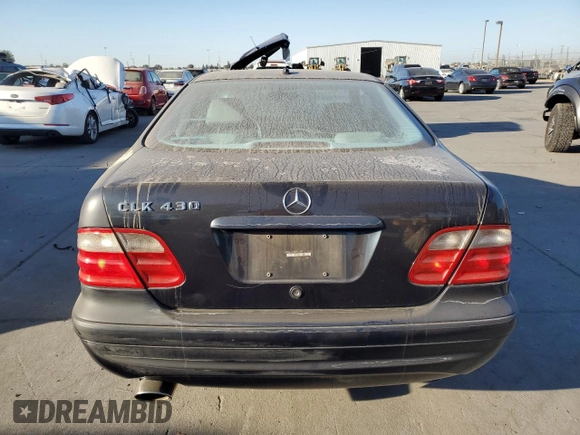 2002 Mercedes-Benz CLK 320/430 with VIN WDBLJ70G32T111304, listed as a Copart auction lot 73843804 with 141,980 mi miles and Salvage Title. Bid and sale history available at DreamBid. Image 6.