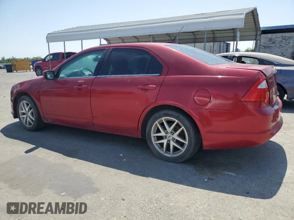2012 Ford Fusion SEL с VIN 3FAHP0JA1CR302302, выставлен на аукционе Copart как лот 62183245 с пробегом 106 182 миль миль и Чистый • Clean title. История ставок и продаж доступна на DreamBid. Изображение 2.