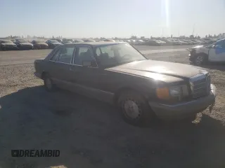 1988 Mercedes-Benz 420 with VIN WDBCA35D5JA388327, listed as a Copart auction lot 74394414 with 299,950 mi miles and Salvage Title. Bid and sale history available at carsss.com. Image 4.