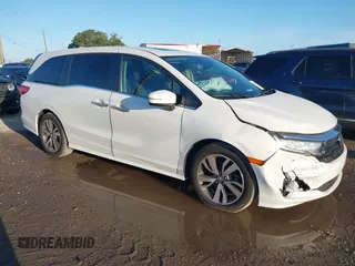 2022 Honda Odyssey Touring with VIN 5FNRL6H85NB058948, listed as a IAAI auction lot 42579157 with 53,669 mi miles and . Bid and sale history available at DreamBid. Image 1.