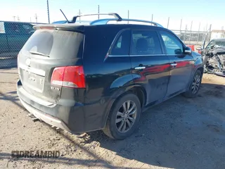 2012 Kia Sorento SX with VIN 5XYKW4A26CG207358, listed as a IAAI auction lot 41521909 with 215,689 mi miles. Bid and sale history available at carsss.com. Image 4.
