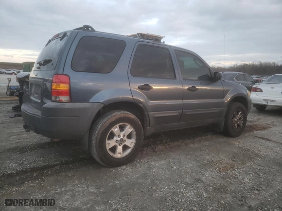 2005 Ford Escape XLT with VIN 1FMCU031X5KA51812, listed as a Copart auction lot 47661045 with 244,572 mi miles and Salvage Title. Bid and sale history available at carsss.com. Image 3.